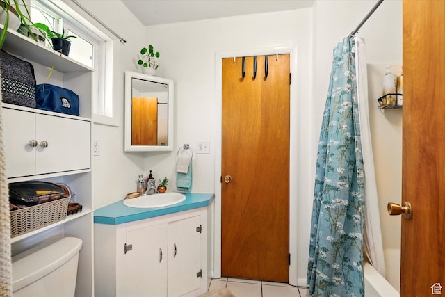 1317 S 400 E, Trenton, UT 84338 - full bathroom featuring tile patterned flooring, toilet, and vanity