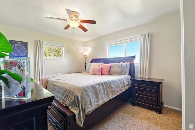 1317 S 400 E, Trenton, UT 84338 - bedroom with light carpet, baseboards, and ceiling fan
