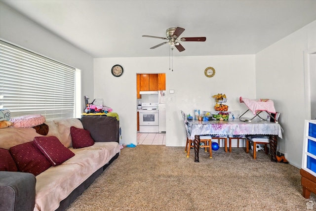 1317 S 400 E, Trenton, UT 84338 - living room featuring ceiling fan and light colored carpet