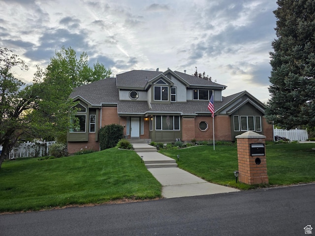 22 Snowstar Ln, Sandy, UT 84092 - traditional home featuring brick siding and a shingled roof