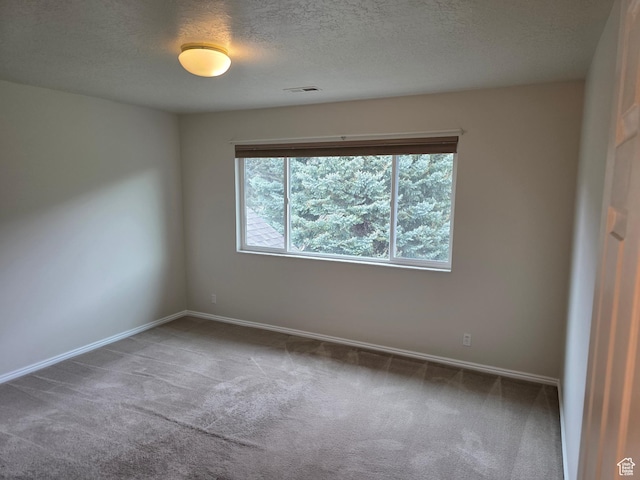 22 Snowstar Ln, Sandy, UT 84092 - carpeted spare room featuring a textured ceiling and baseboards