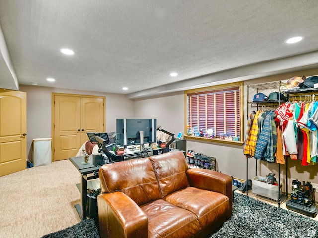 carpeted living room with recessed lighting