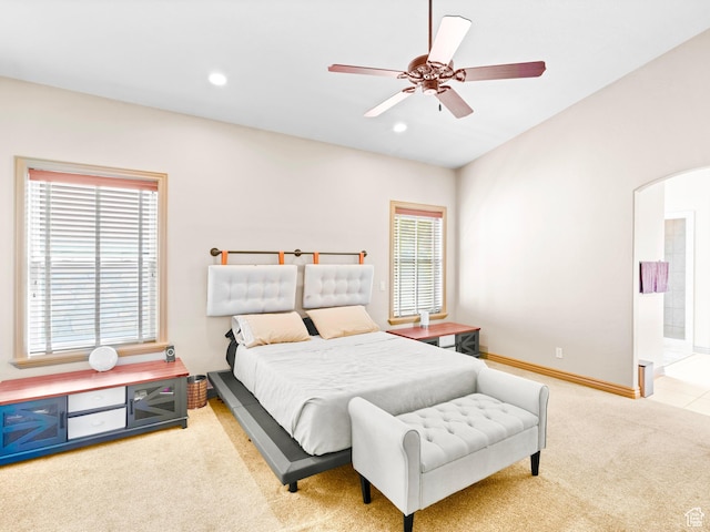 bedroom with carpet, recessed lighting, baseboards, a ceiling fan, and connected bathroom