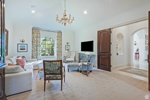 living room with a chandelier, arched walkways, high vaulted ceiling, recessed lighting, and baseboards