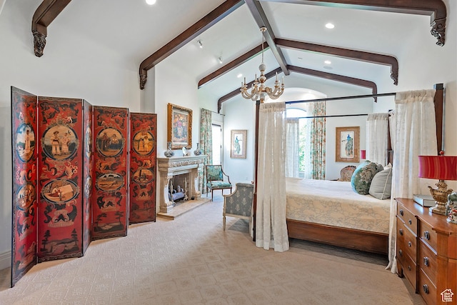bedroom with carpet, a chandelier, recessed lighting, and a fireplace with raised hearth
