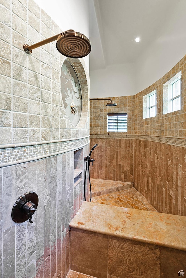 bathroom with tiled shower