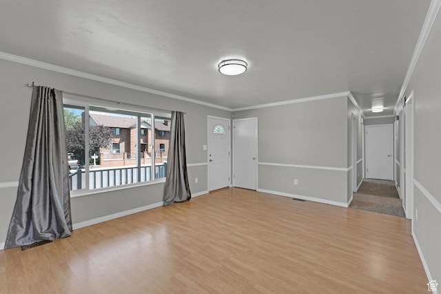 621 W 920 N, Orem, UT 84057 - unfurnished living room featuring wood finished floors, crown molding, and baseboards