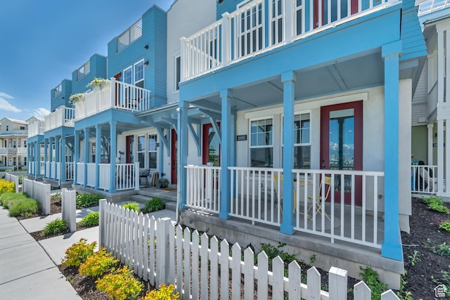 surrounding community featuring fence and a residential view