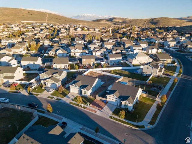 aerial view of residential area with mountains