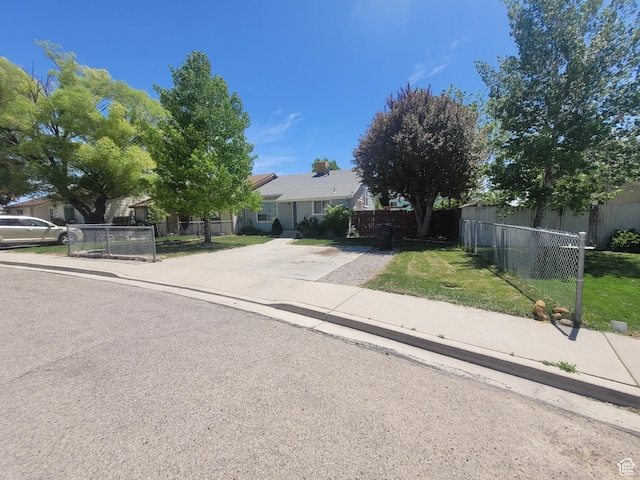 view of front of house featuring fence
