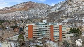 view of building exterior with a mountain view
