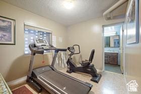 exercise room with baseboards