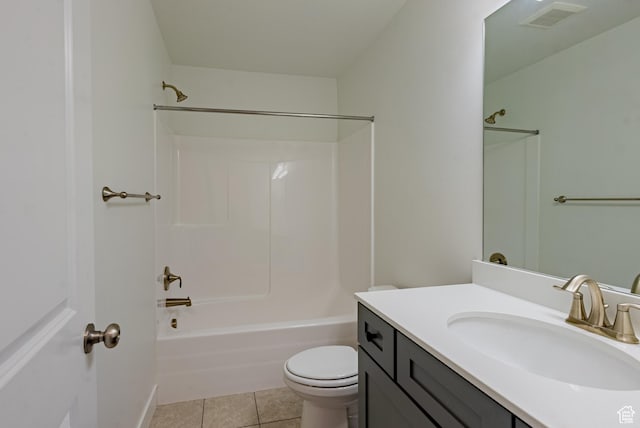 full bathroom with tile patterned floors, toilet, vanity, and bathtub / shower combination