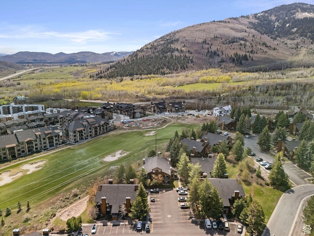 view of property location featuring a mountainous background and nearby suburban area