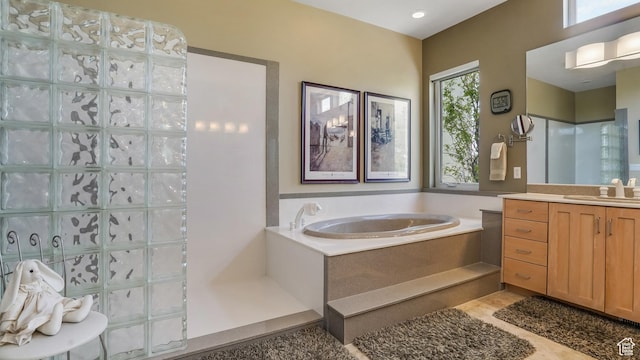 10804 S Lostwood Dr, Sandy, UT 84092 - full bathroom with a bath, vanity, and a walk in shower