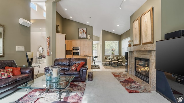 10804 S Lostwood Dr, Sandy, UT 84092 - living room featuring high vaulted ceiling, a fireplace, and recessed lighting