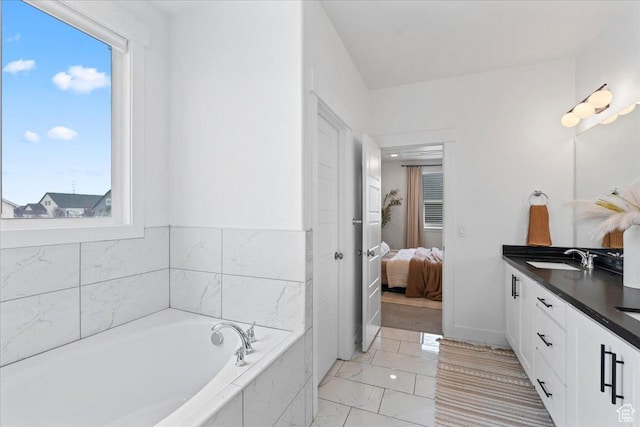 13741 S 3870 W, Riverton, UT 84065 - full bath featuring double vanity, connected bathroom, marble look tiles, a bath, and plenty of natural light
