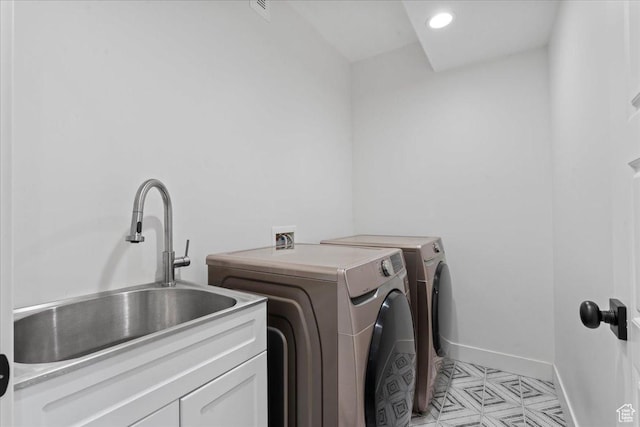 13741 S 3870 W, Riverton, UT 84065 - washroom featuring separate washer and dryer, cabinet space, and baseboards