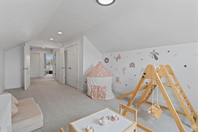 13741 S 3870 W, Riverton, UT 84065 - playroom featuring vaulted ceiling, baseboards, and carpet