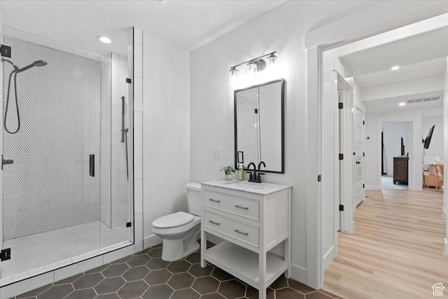 13741 S 3870 W, Riverton, UT 84065 - bathroom with a stall shower, vanity, toilet, and recessed lighting