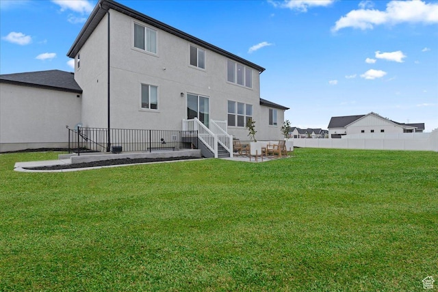 13741 S 3870 W, Riverton, UT 84065 - rear view of property featuring a patio and stucco siding