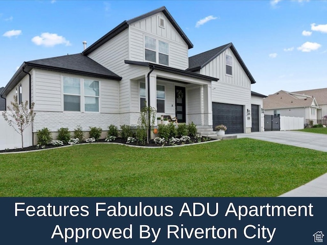 13741 S 3870 W, Riverton, UT 84065 - view of front of property with board and batten siding, driveway, covered porch, a garage, and brick siding