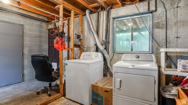 washroom with washing machine and dryer