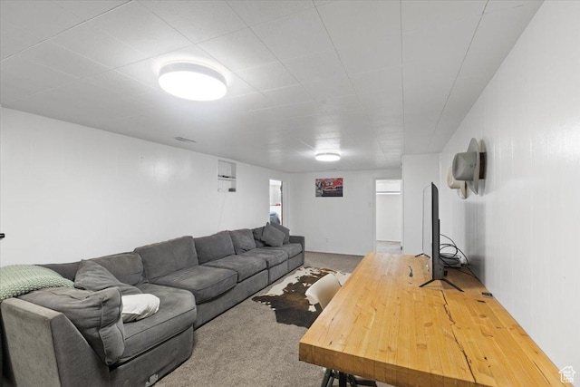 living area with carpet