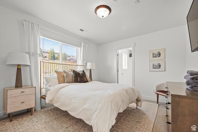 bedroom featuring baseboards