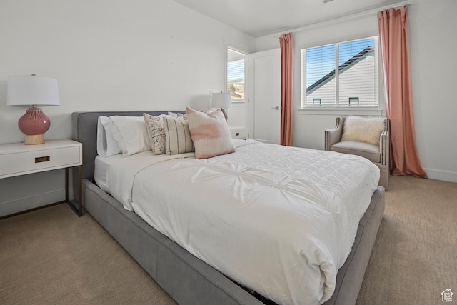 bedroom with light carpet