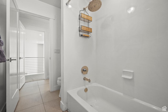 full bath with toilet, tile patterned flooring, and bathtub / shower combination
