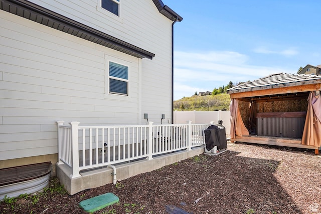 view of home's exterior featuring fence