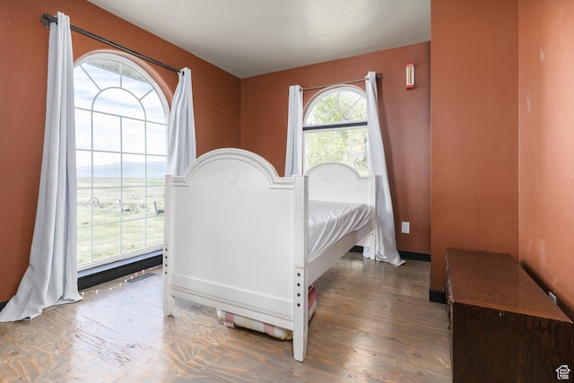bedroom featuring wood finished floors