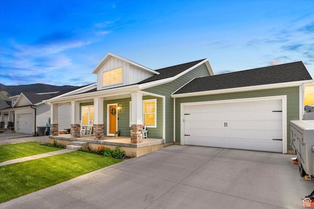 40 E 920 N, Santaquin, UT 84655 - view of front of home with covered porch, board and batten siding, concrete driveway, and an attached garage