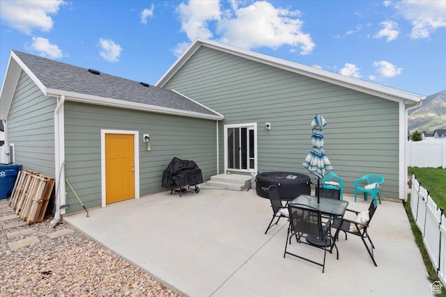 40 E 920 N, Santaquin, UT 84655 - rear view of property featuring a patio and a shingled roof