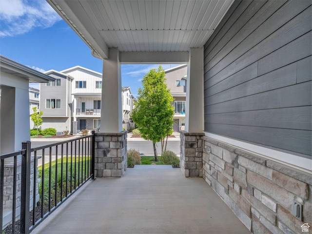 balcony featuring a residential view