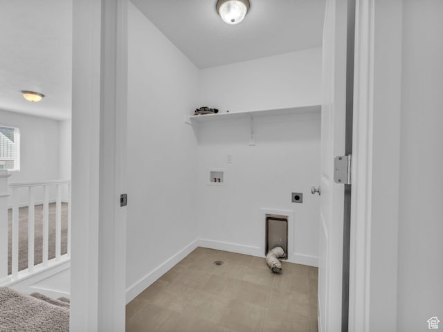 laundry room with electric dryer hookup, hookup for a washing machine, and baseboards