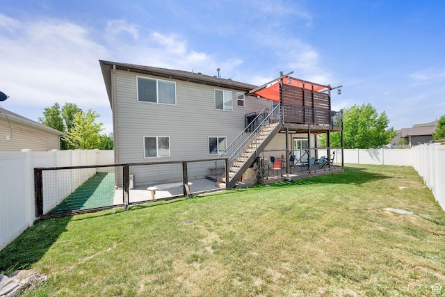 980 Woodstock Dr, North Salt Lake, UT 84054 - rear view of property with stairway, a deck, a patio area, and a gate