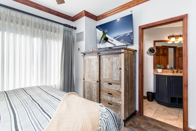 3000 Canyons Resort Dr Unit 3716, Park City, UT 84098 - bedroom with ornamental molding, wood finished floors, a sink, and baseboards