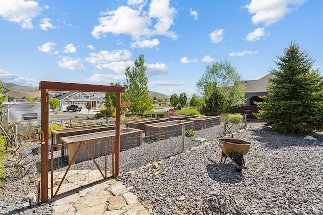 9288 N Harmony Way, Eagle Mountain, UT 84005 - view of home's community with a vegetable garden and a mountain view