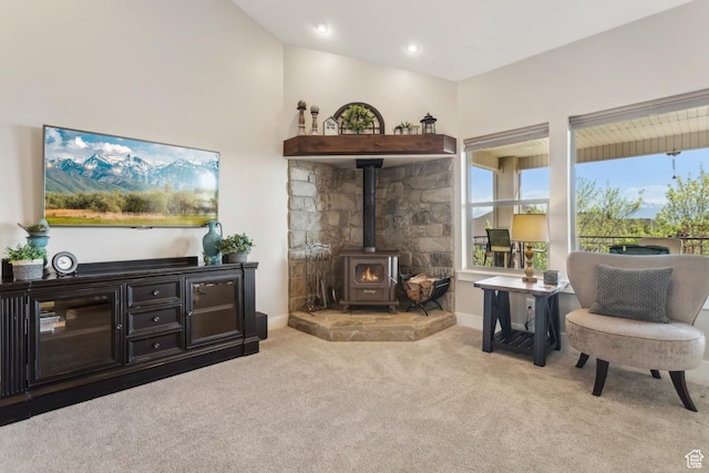 9288 N Harmony Way, Eagle Mountain, UT 84005 - sitting room featuring carpet flooring, a wood stove, and baseboards