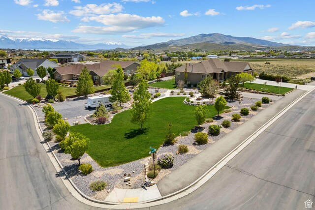 9288 N Harmony Way, Eagle Mountain, UT 84005 - aerial perspective of suburban area with mountains