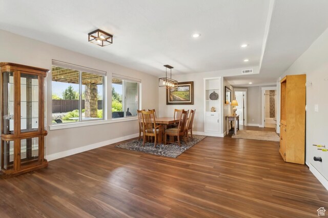 9288 N Harmony Way, Eagle Mountain, UT 84005 - dining space with baseboards, wood finished floors, recessed lighting, and built in features