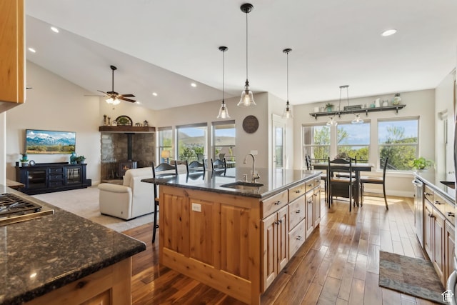 9288 N Harmony Way, Eagle Mountain, UT 84005 - kitchen with a sink, hardwood / wood-style floors, dark stone countertops, ceiling fan, and recessed lighting