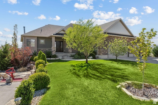 9288 N Harmony Way, Eagle Mountain, UT 84005 - rear view of property featuring stone siding and a lawn