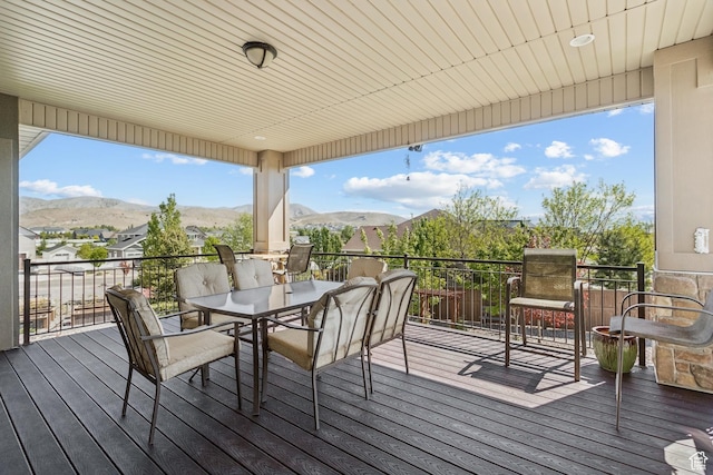 9288 N Harmony Way, Eagle Mountain, UT 84005 - wooden terrace featuring outdoor dining area and a mountain view