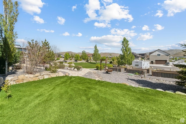 9288 N Harmony Way, Eagle Mountain, UT 84005 - view of green lawn featuring a residential view and a mountain view