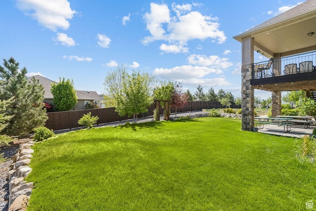 9288 N Harmony Way, Eagle Mountain, UT 84005 - view of yard featuring a balcony and a patio