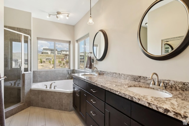 9288 N Harmony Way, Eagle Mountain, UT 84005 - full bathroom featuring a bath, a stall shower, double vanity, and tile patterned floors