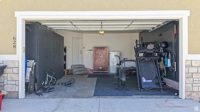 garage featuring a garage door opener